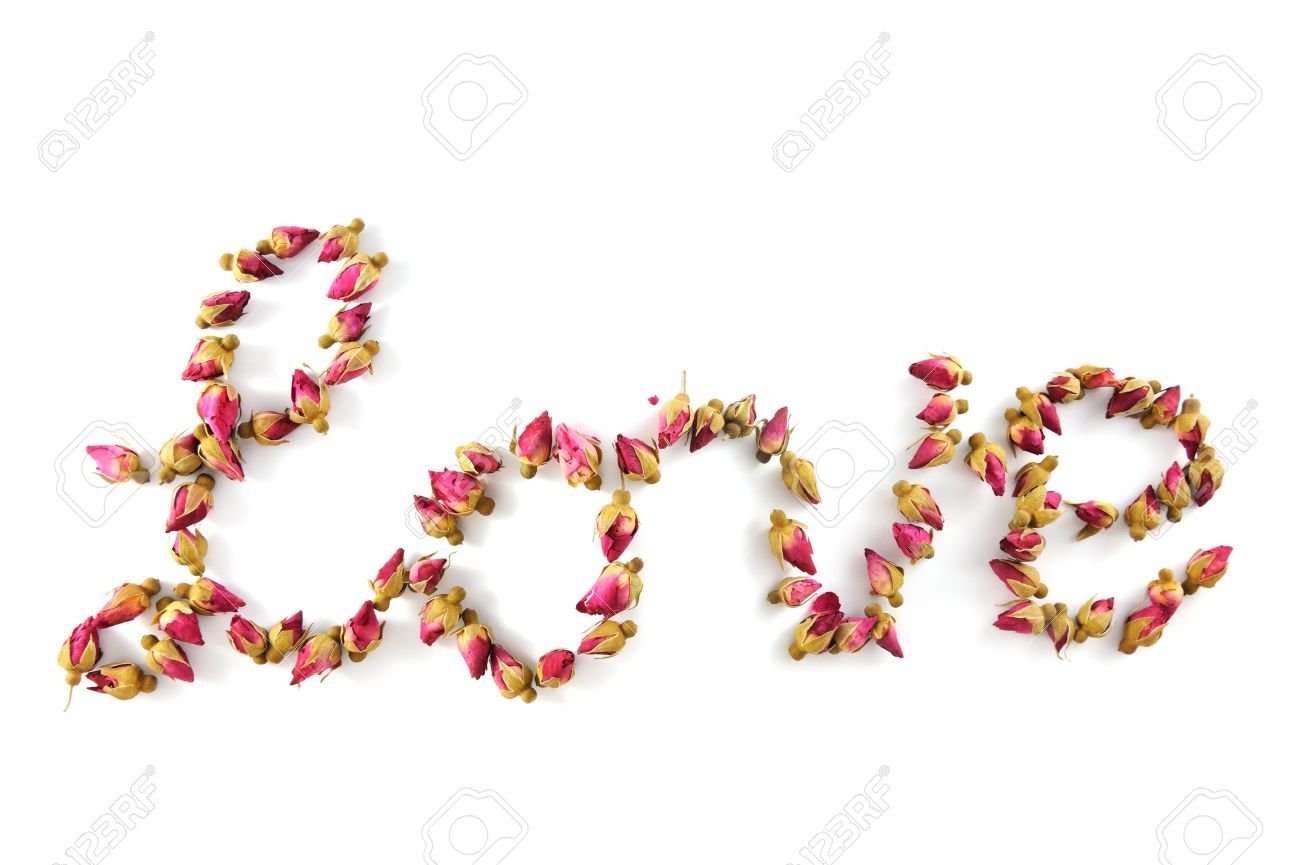 14167381 love word made of dried flowers on white background